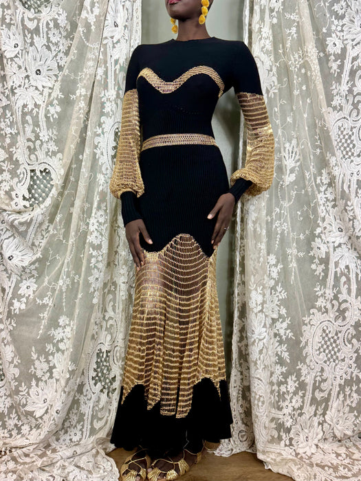 Alexander McQueen, black knit and gold net dress