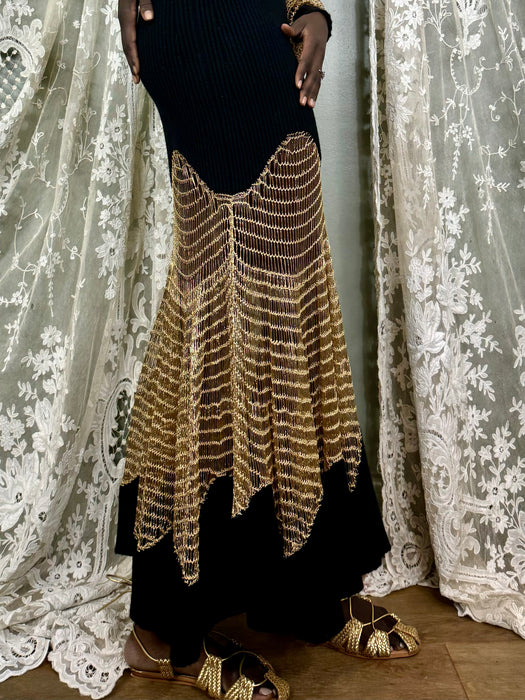 Alexander McQueen, black knit and gold net dress