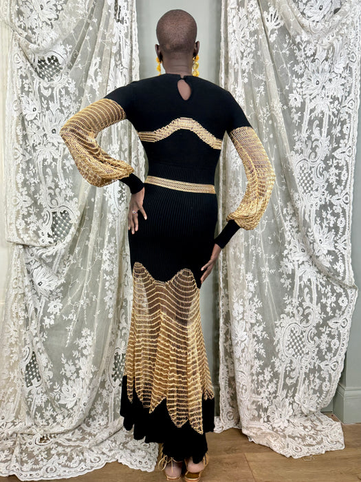 Alexander McQueen, black knit and gold net dress