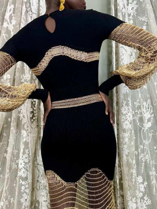 Alexander McQueen, black knit and gold net dress