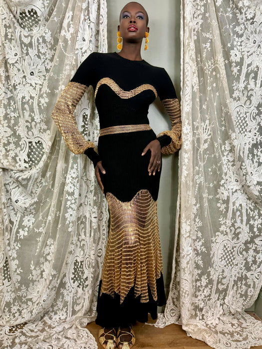 Alexander McQueen, black knit and gold net dress